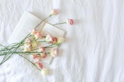 bed-with-book-and-flowers_373x_2x.jpg