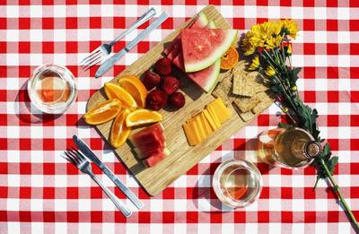 picnic-snacks-wine-and-flowers_373x_2x.progressive.jpg